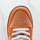 Designer Concepts x SB Dunk Low “Orange Lobster”