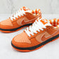 Designer Concepts x SB Dunk Low “Orange Lobster”