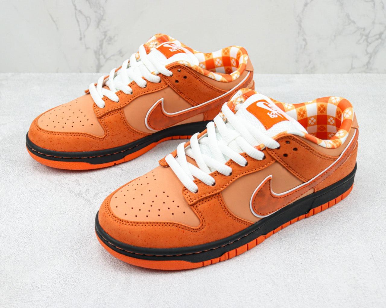 Designer Concepts x SB Dunk Low “Orange Lobster”