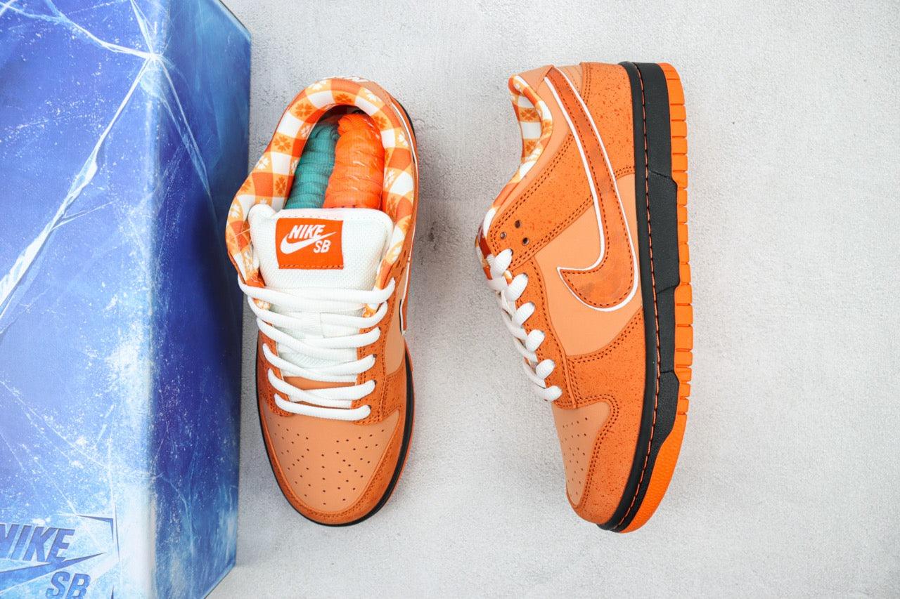 Designer Concepts x SB Dunk Low “Orange Lobster”