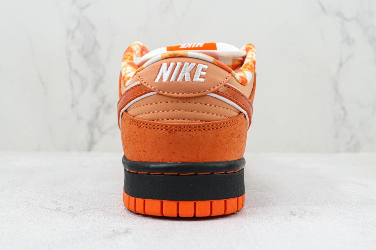 Designer Concepts x SB Dunk Low “Orange Lobster”