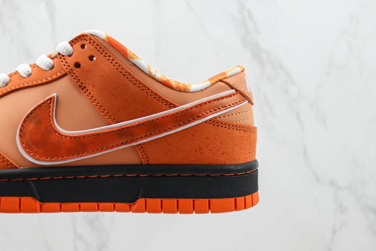 Designer Concepts x SB Dunk Low “Orange Lobster”