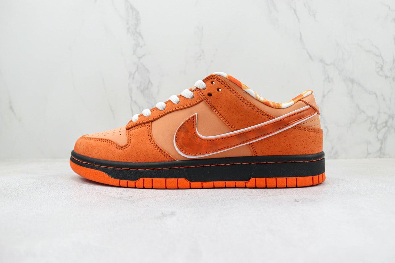 Designer Concepts x SB Dunk Low “Orange Lobster”