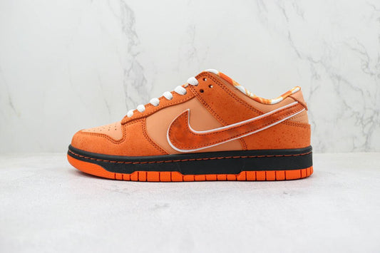 Designer Concepts x SB Dunk Low “Orange Lobster”