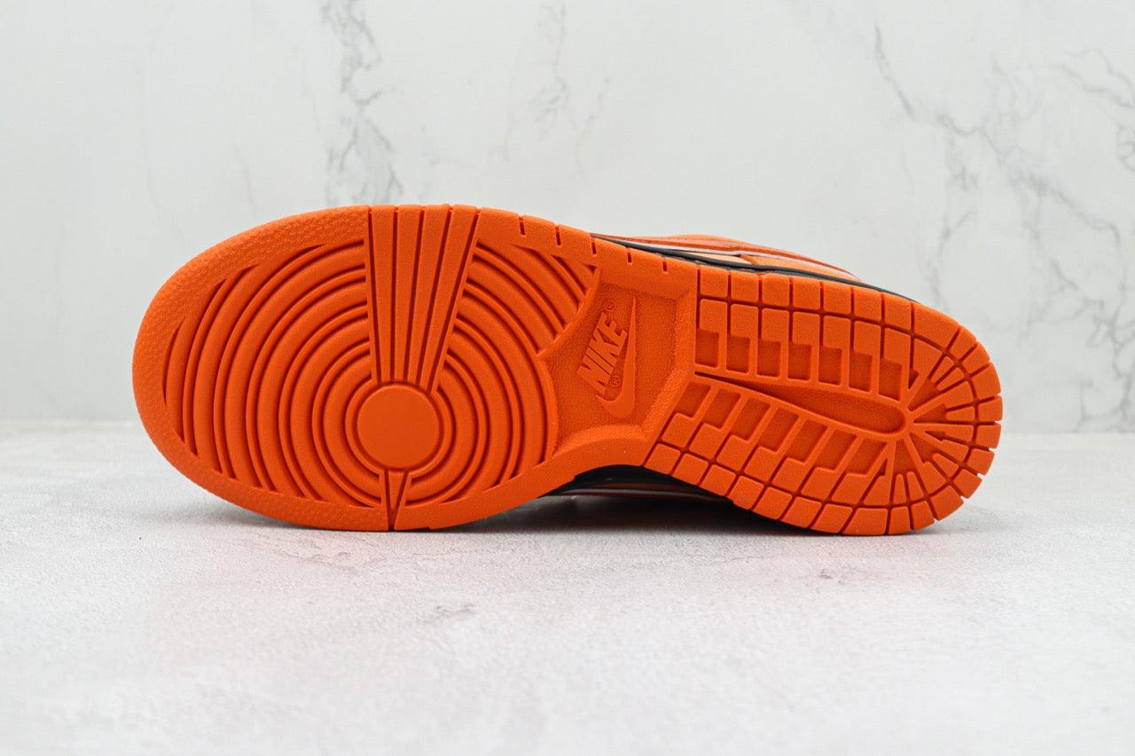 Designer Concepts x SB Dunk Low “Orange Lobster”